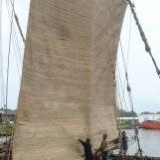 085   Working on the Jewel's palm leaf mat sails