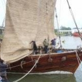 086   Working on the Jewel's palm leaf mat sails