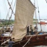 088   Working on the Jewel's palm leaf mat sails