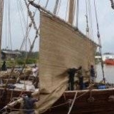 091   Working on the Jewel's palm leaf mat sails