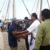 107   Deputy Harbour Master Gajaba (Port Pilot) and  Port Manager Nirmal say goodbye to Capt. Saleh