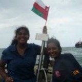 131   Capt. Fernando's daughter Rashmi & Navy Commodore's daughter Kavindya wave the Omani flag that Saleh threw across whilst they we