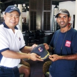 153   Captain Martin Lim exchanges gifts of appriciation with  Captain Saleh Al Jabri
