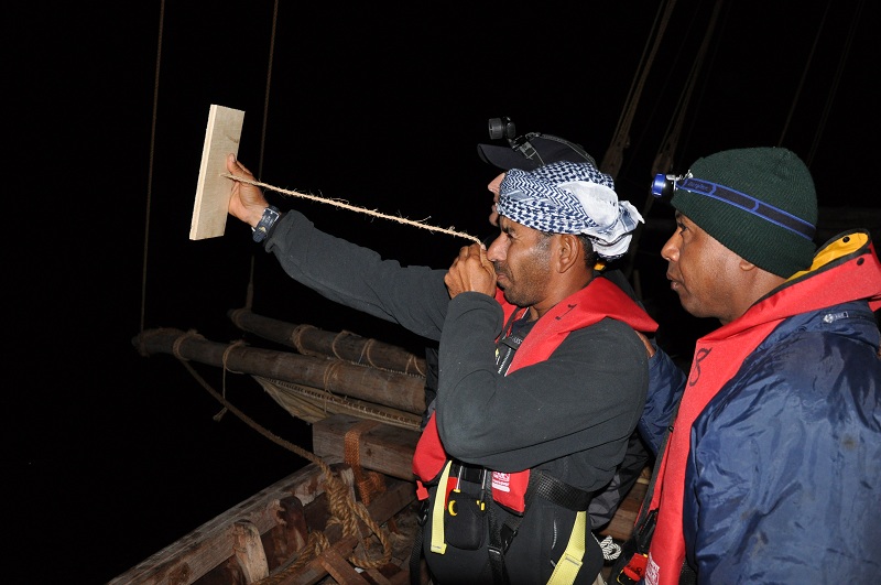 Captain Saleh using a traditional kamal